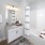 a bathroom with a tub toilet and sink