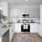a kitchen with white cabinets